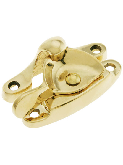 Large Size Traditional Solid Brass Sash Lock in Unlacquered Brass.